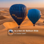 A hot air balloon floating over the Dubai desert with passengers enjoying the scenic flight.