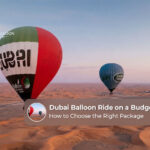 Tourists enjoying an affordable hot air balloon flight over the Dubai desert at sunrise.